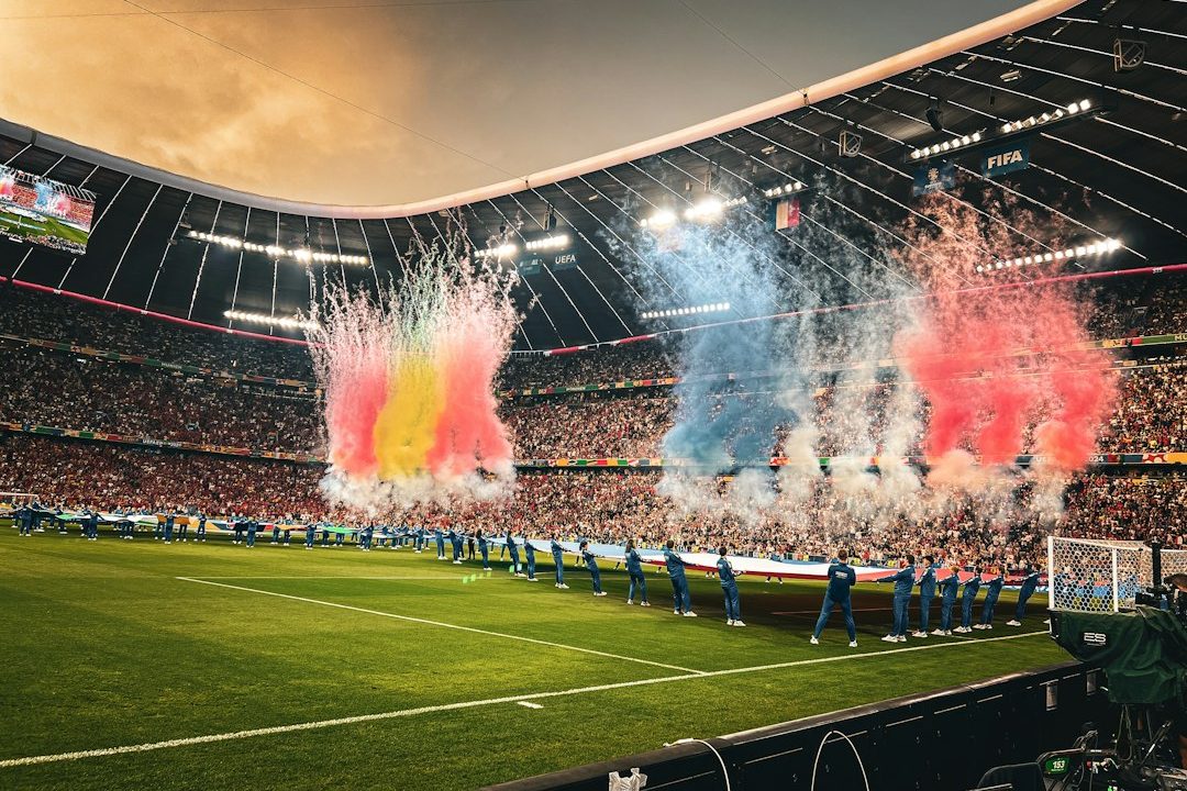 Pertandingan sepak bola di stadion sebagai ilustrasi berita taruhan olahraga